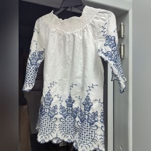 A white cotton blouse blue embroidery